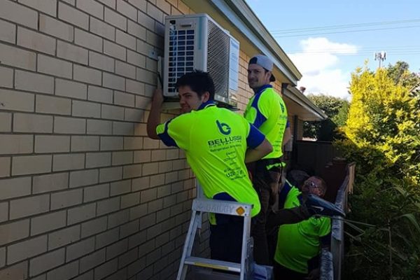 Our team replacing an old airconditioning unit with a new reverse cycle unit